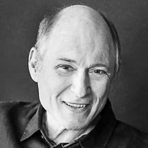 Black and white headshot of John Russonello