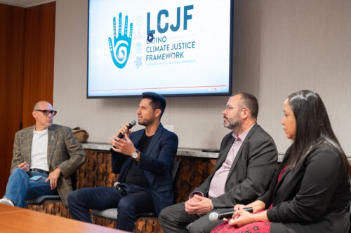 Four people sitting on a panel at an event in Washington DC